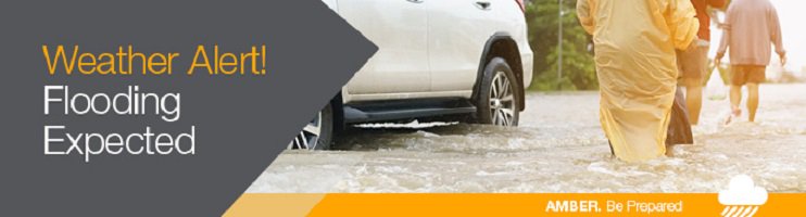 Amber weather alert for flooding expected with car stranded and people walking in flood water